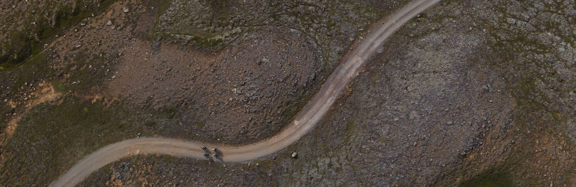 bikers on a windy road