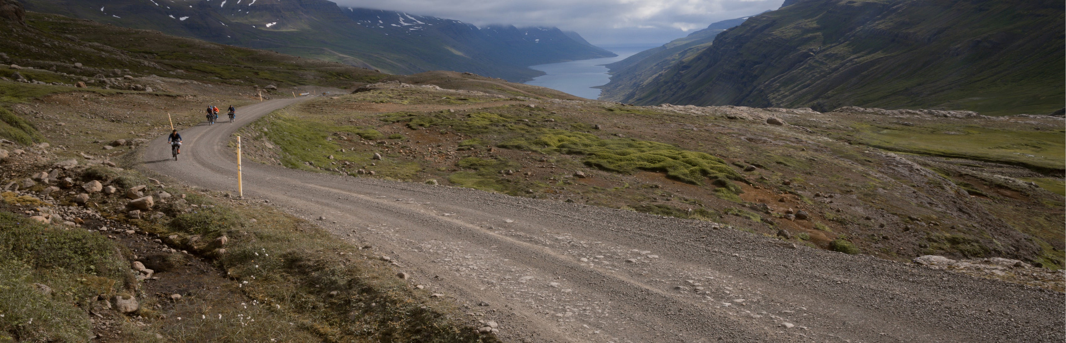 people riding bikes on a dirt trail text says 